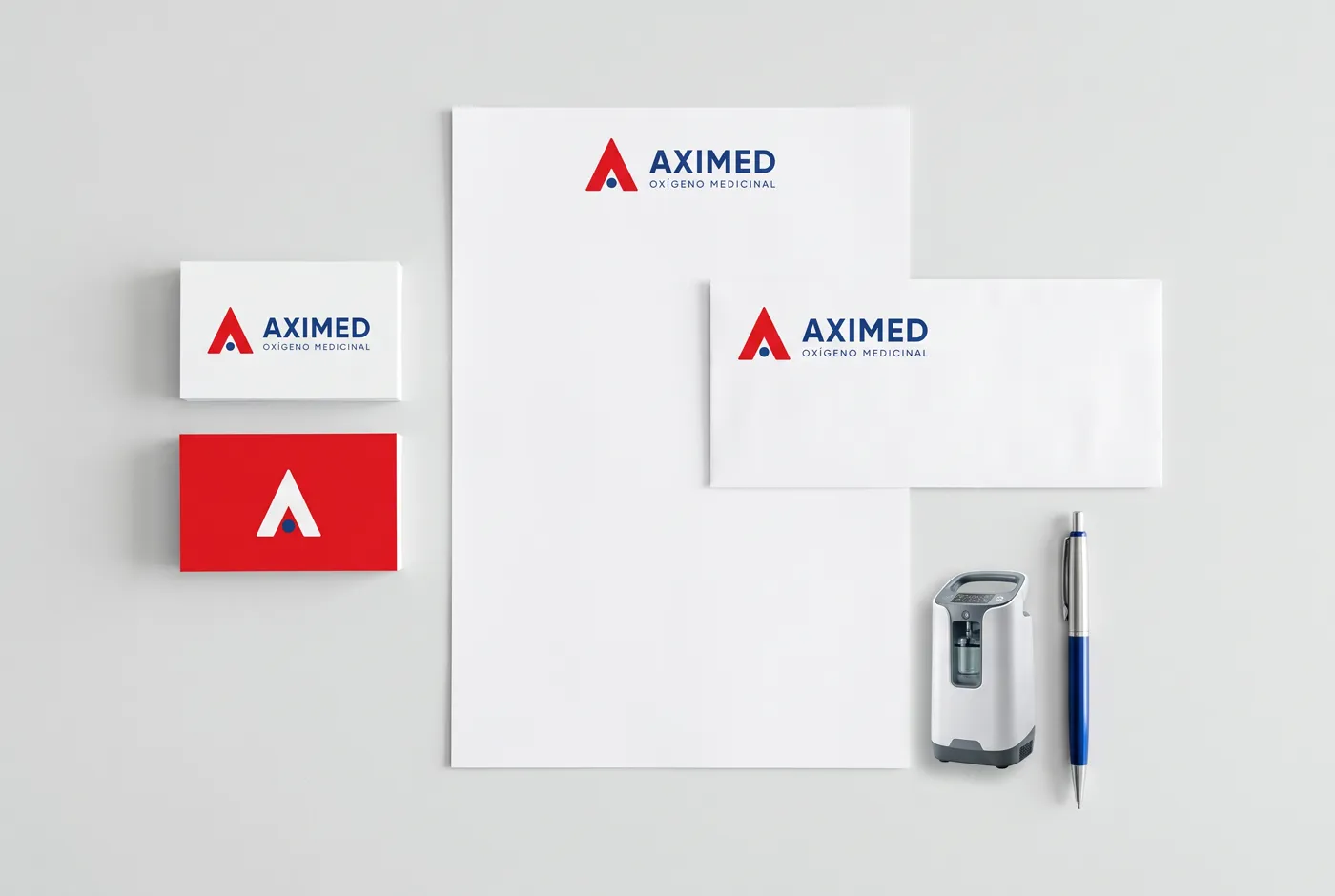 Papelería de AXIMED: tarjetas, hoja carta y sobre